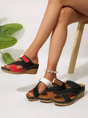 Comfortable cross-strap platform wedge sandals in PU leather.