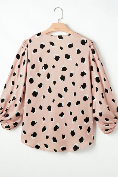 Contrast animal print V-neck long sleeve blouse.