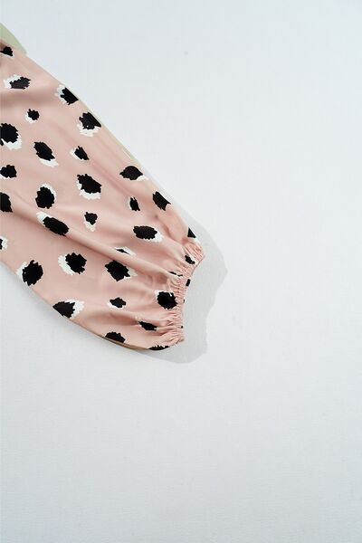 Contrast animal print V-neck long sleeve blouse.