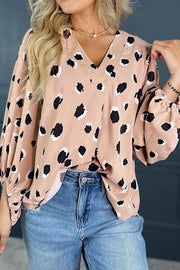 Contrast animal print V-neck long sleeve blouse.