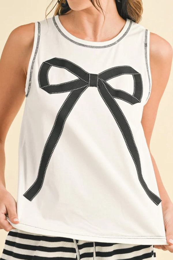 Round neck sleeveless top with contrast bow detail.