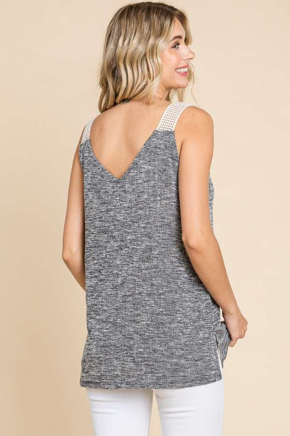 Contrast eyelet strap slit ribbed tank, opaque and moderately stretchy.