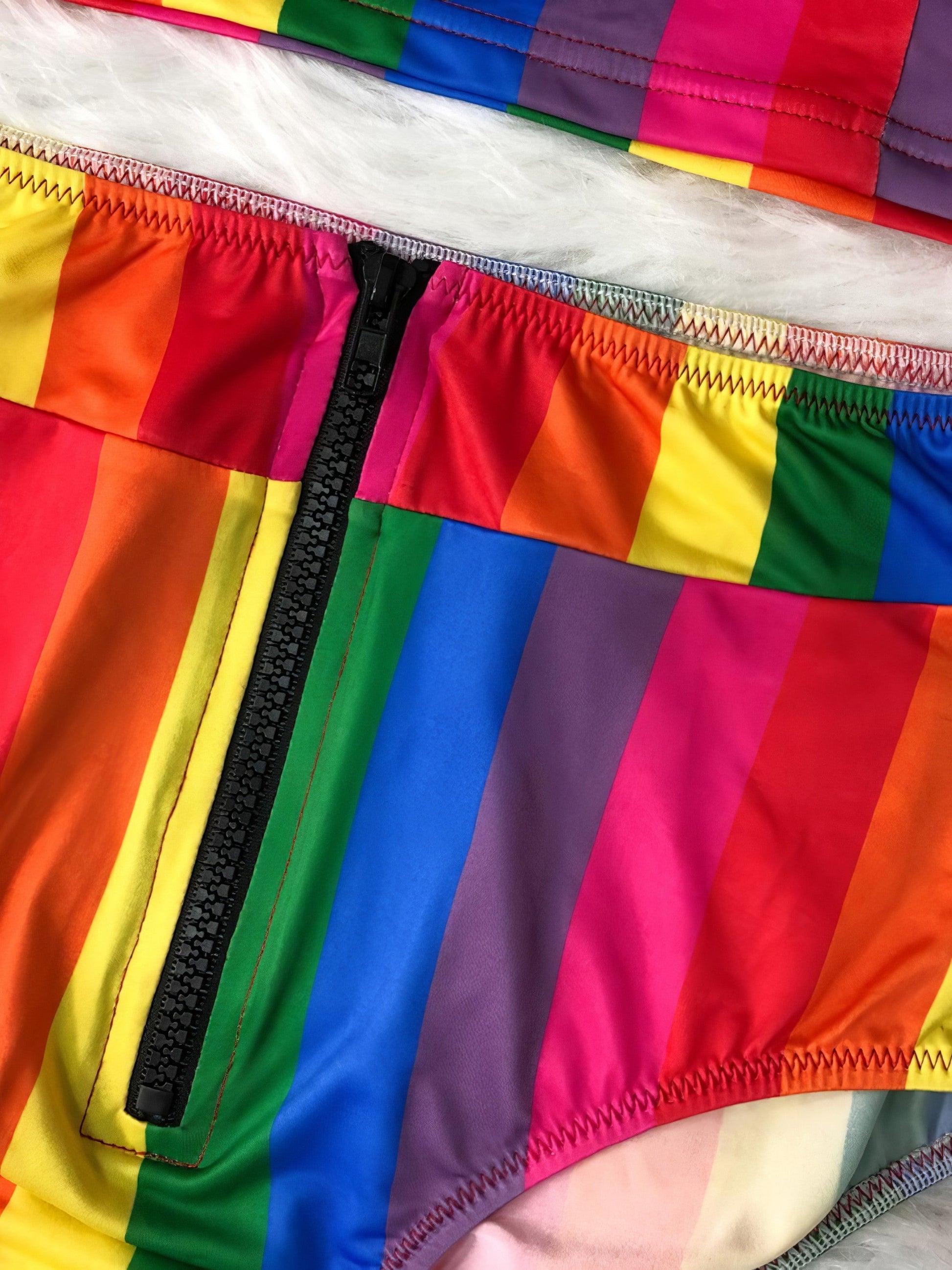 Contrast half-zip top and brief swim set with no padding.