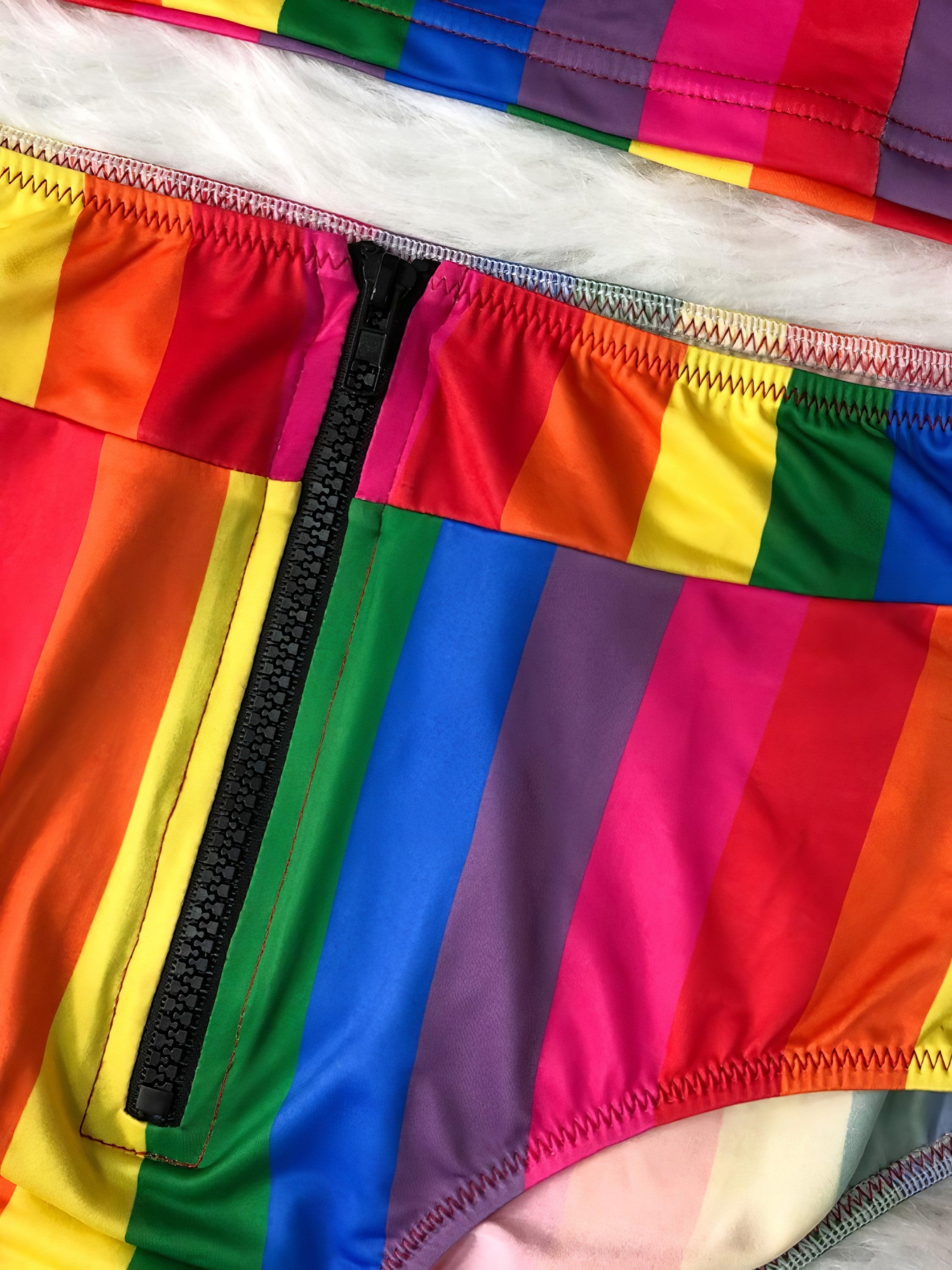 Contrast half-zip top and brief swim set with no padding.