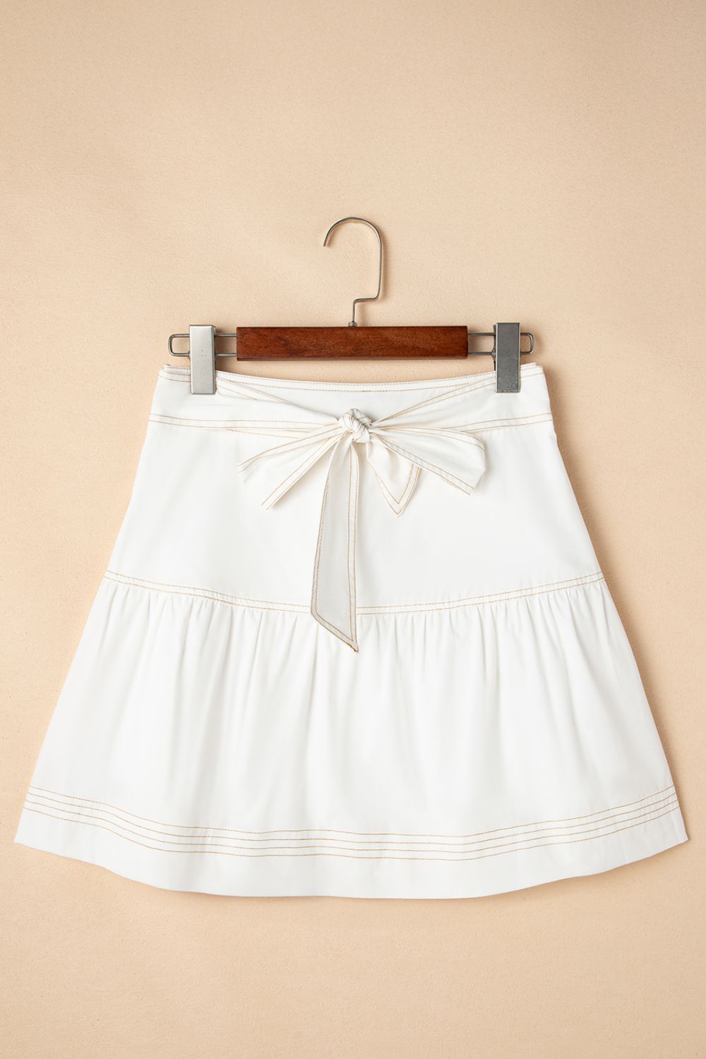 Contrast Stitching Trim Knotted High Waist A-Line Mini Skirt.