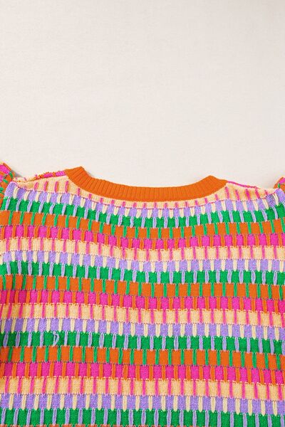 Contrast striped V-neck knit top.