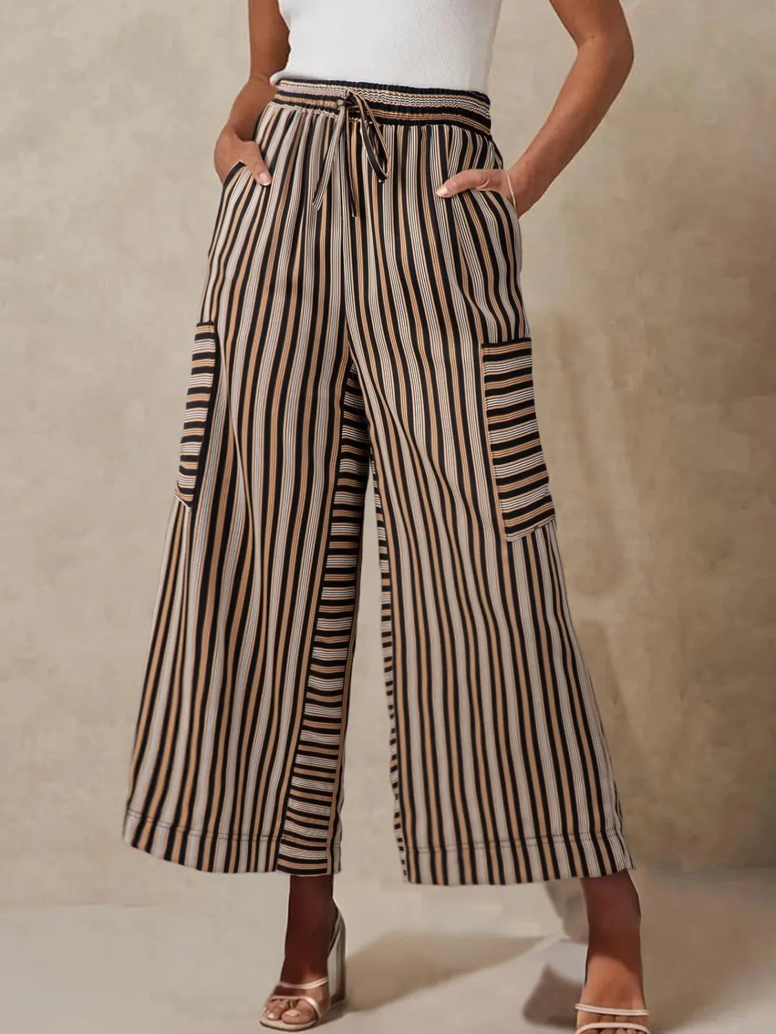 Contrast striped wide leg pants with pockets.