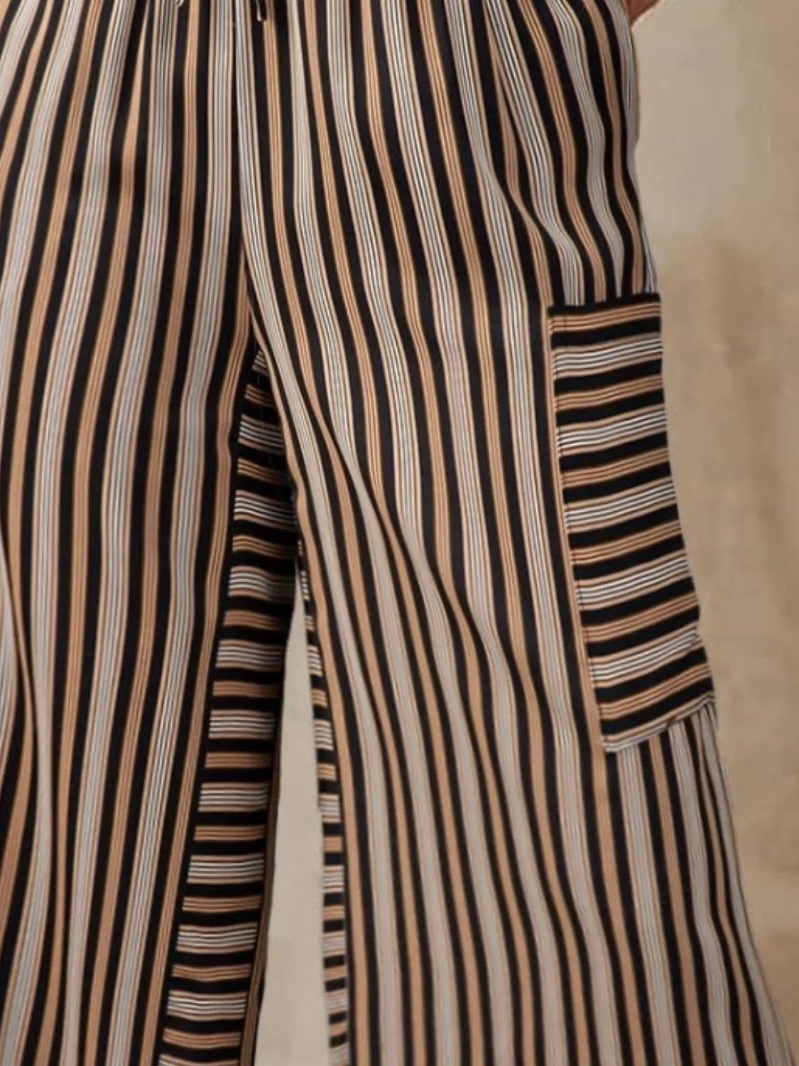 Contrast striped wide leg pants with pockets.