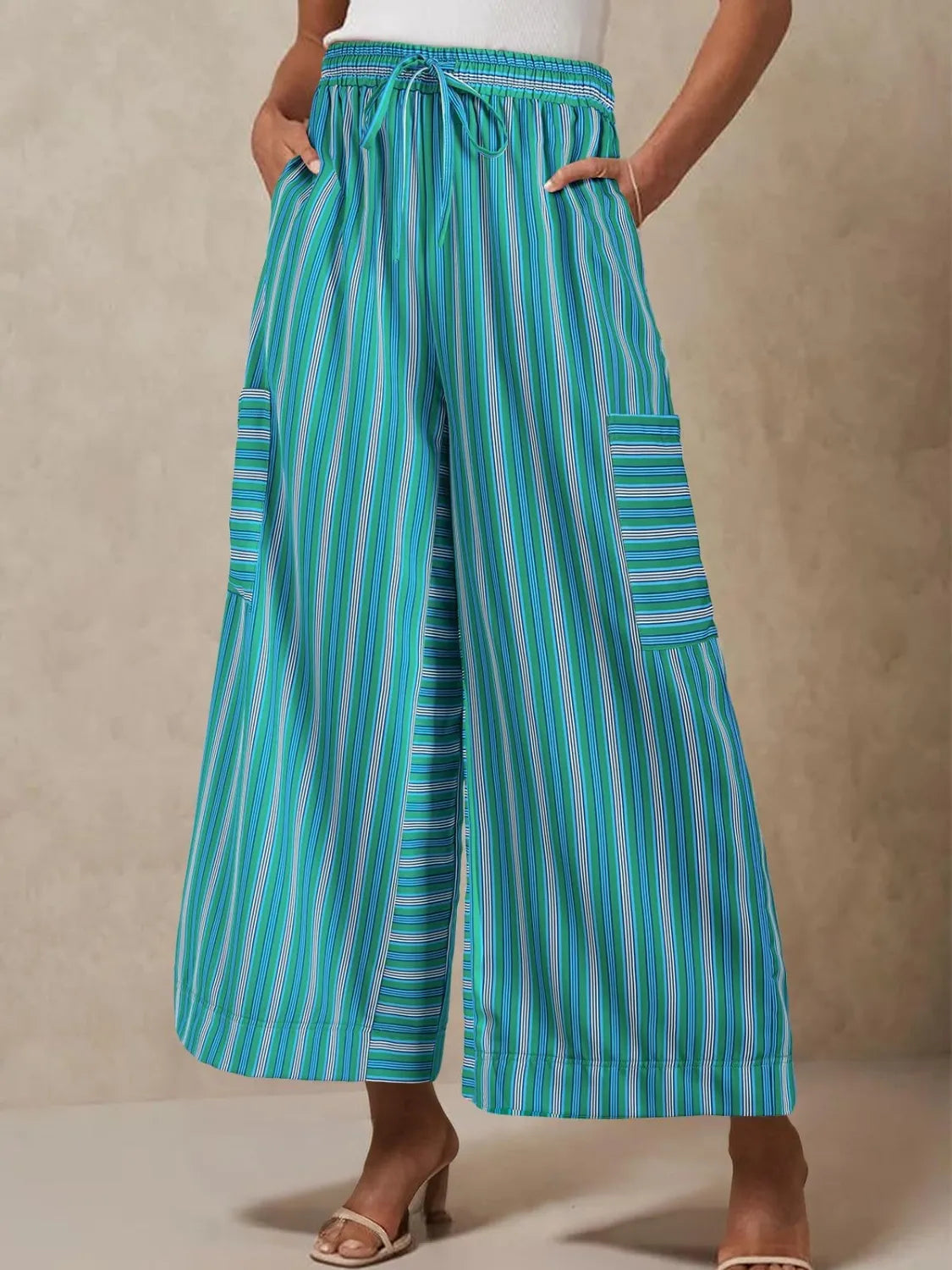 Contrast striped wide leg pants with pockets.