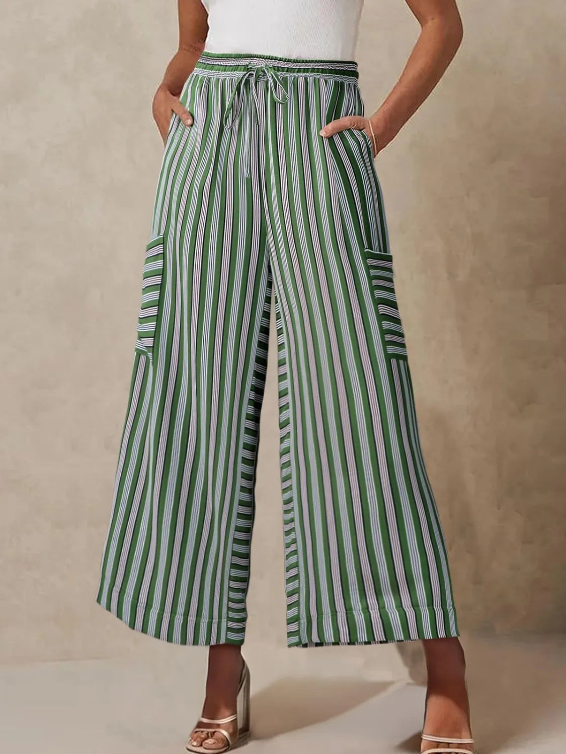 Contrast striped wide leg pants with pockets.