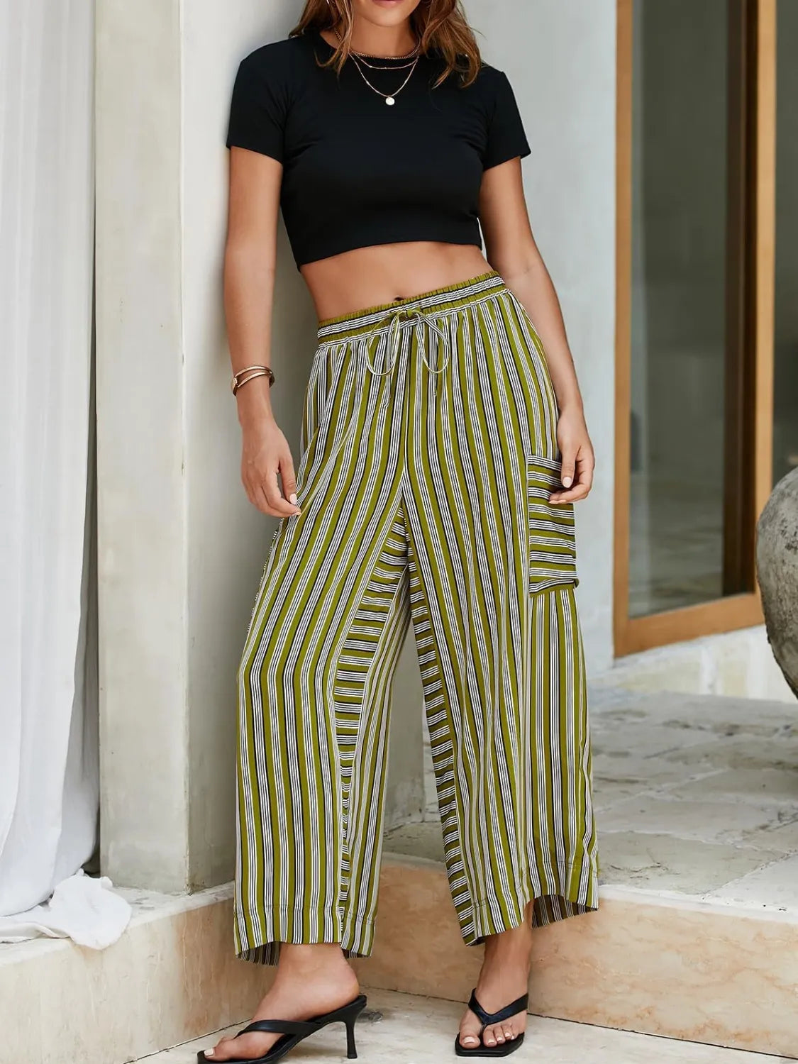 Contrast striped wide leg pants with pockets.