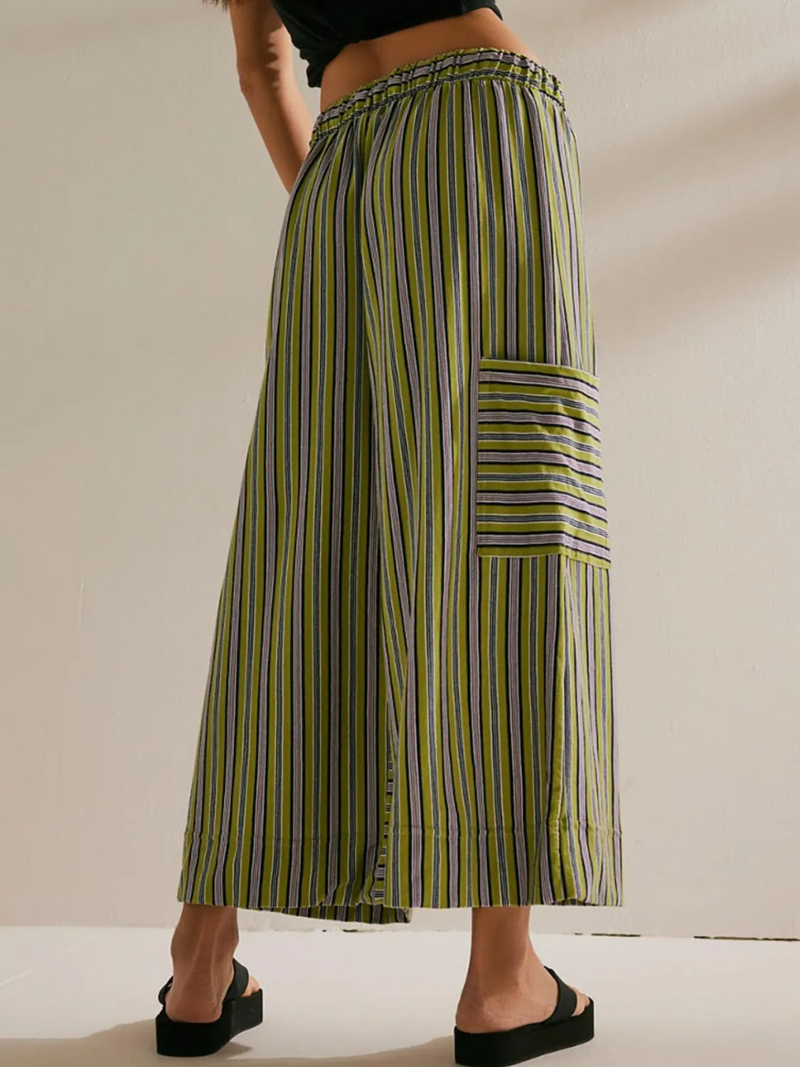 Contrast striped wide leg pants with pockets.