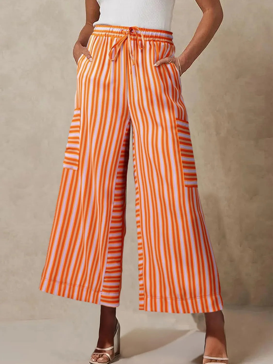 Contrast striped wide leg pants with pockets.