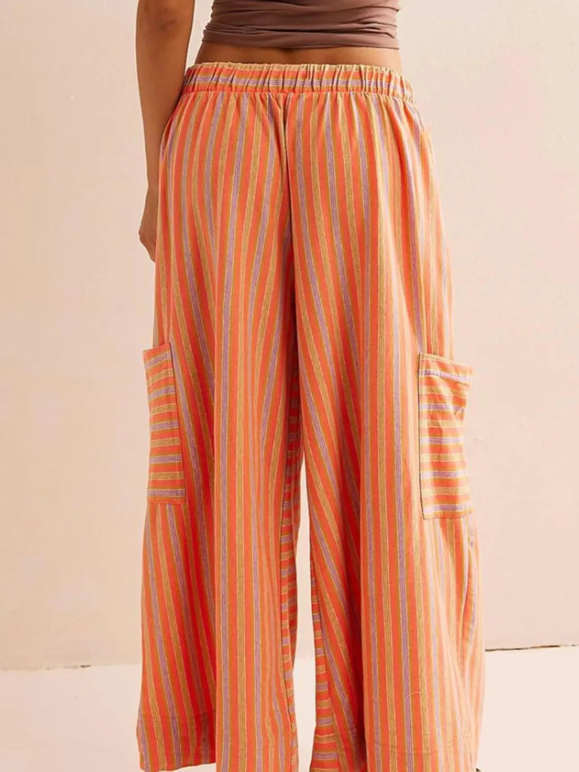 Contrast striped wide leg pants with pockets.