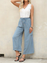 Contrast striped wide leg pants with pockets.