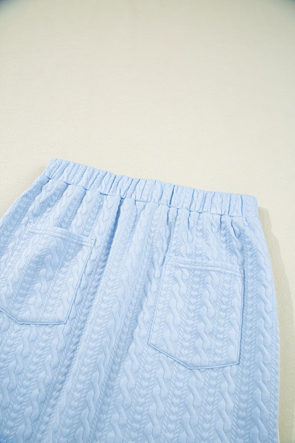 Contrast Trim Textured Crewneck Tee and Pocketed Skirt Set.