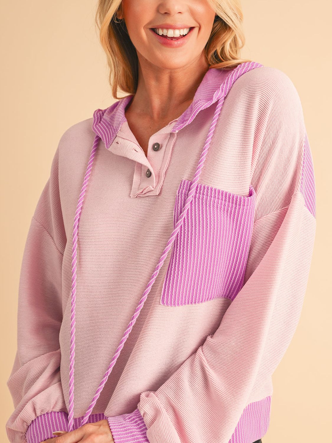 Corded color block drawstring hoodie with pockets.