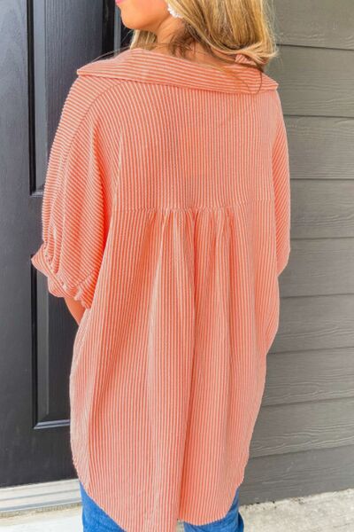 Corded half sleeve button-up high-low shirt.