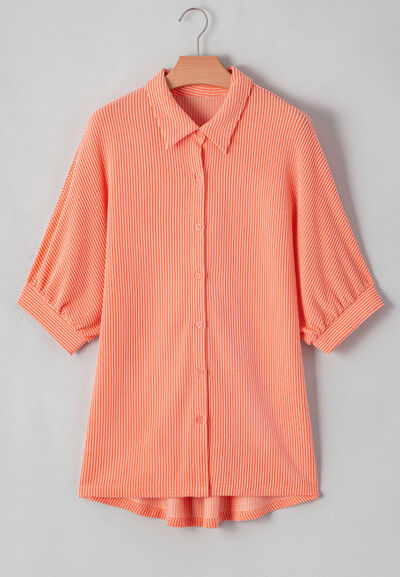 Corded half sleeve button-up high-low shirt.