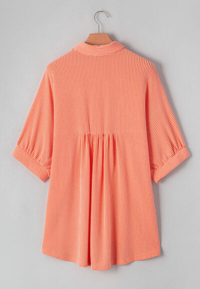 Corded half sleeve button-up high-low shirt.