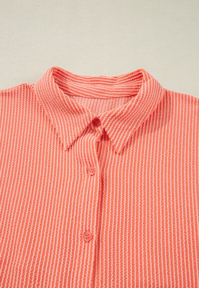 Corded half sleeve button-up high-low shirt.