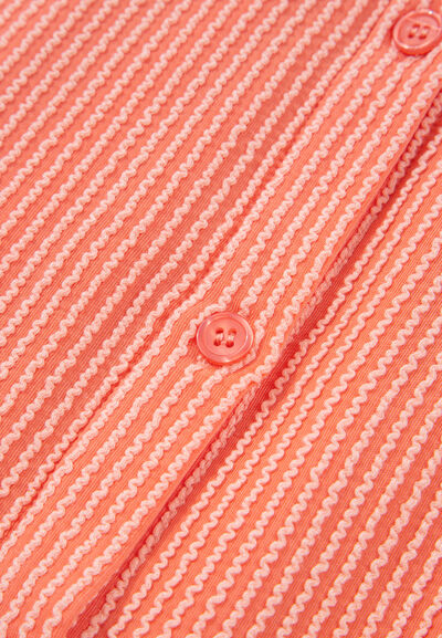 Corded half sleeve button-up high-low shirt.