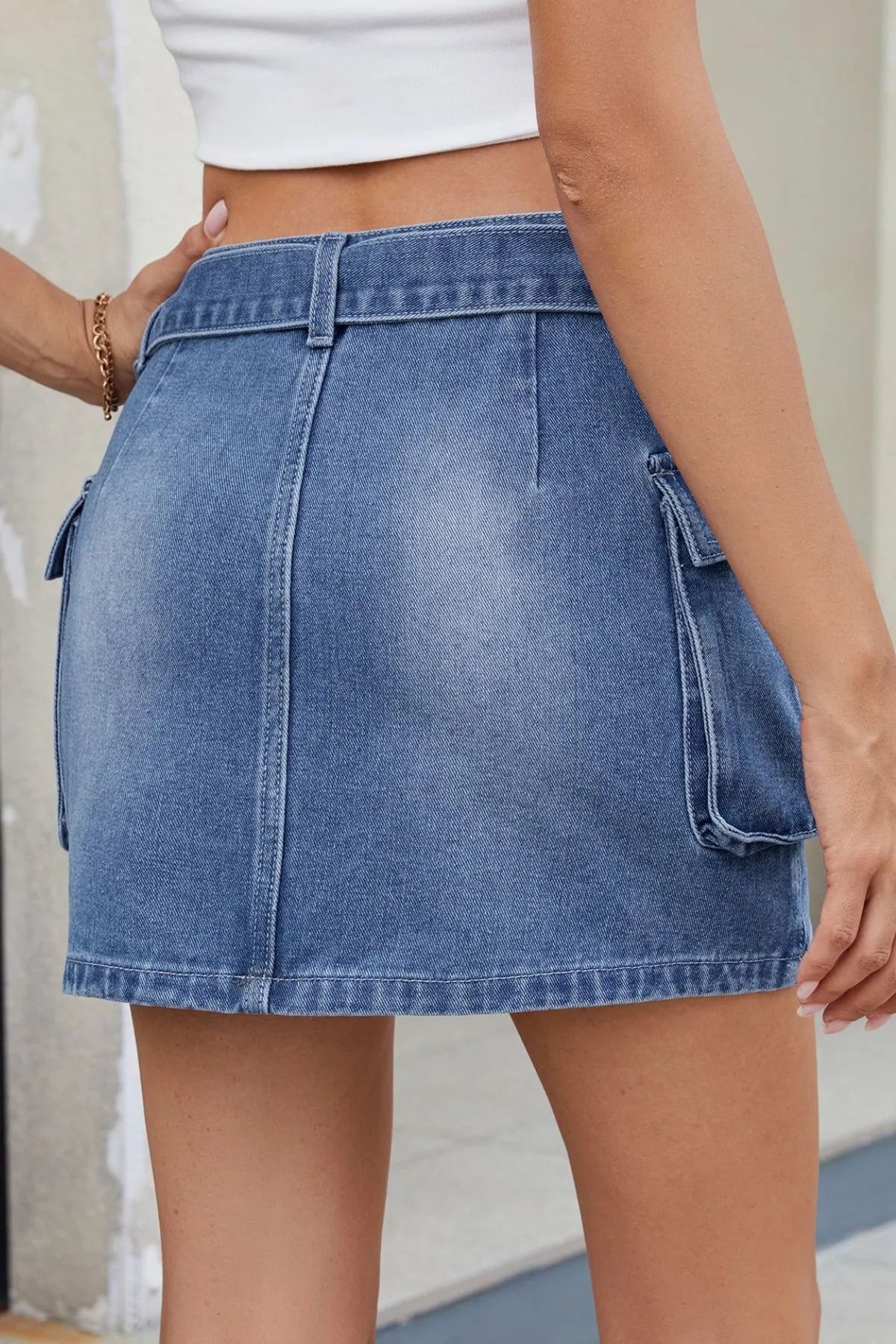 Criss-Cross Waist Detail Denim Mini Skirt.