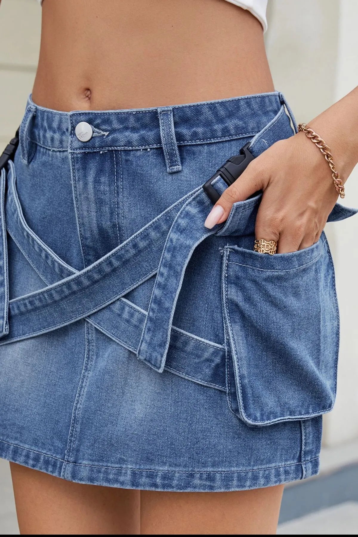Criss-Cross Waist Detail Denim Mini Skirt.