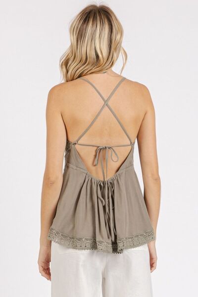 Crisscross back lace detail V-neck cami with tied and backless peplum design, semi-sheer.