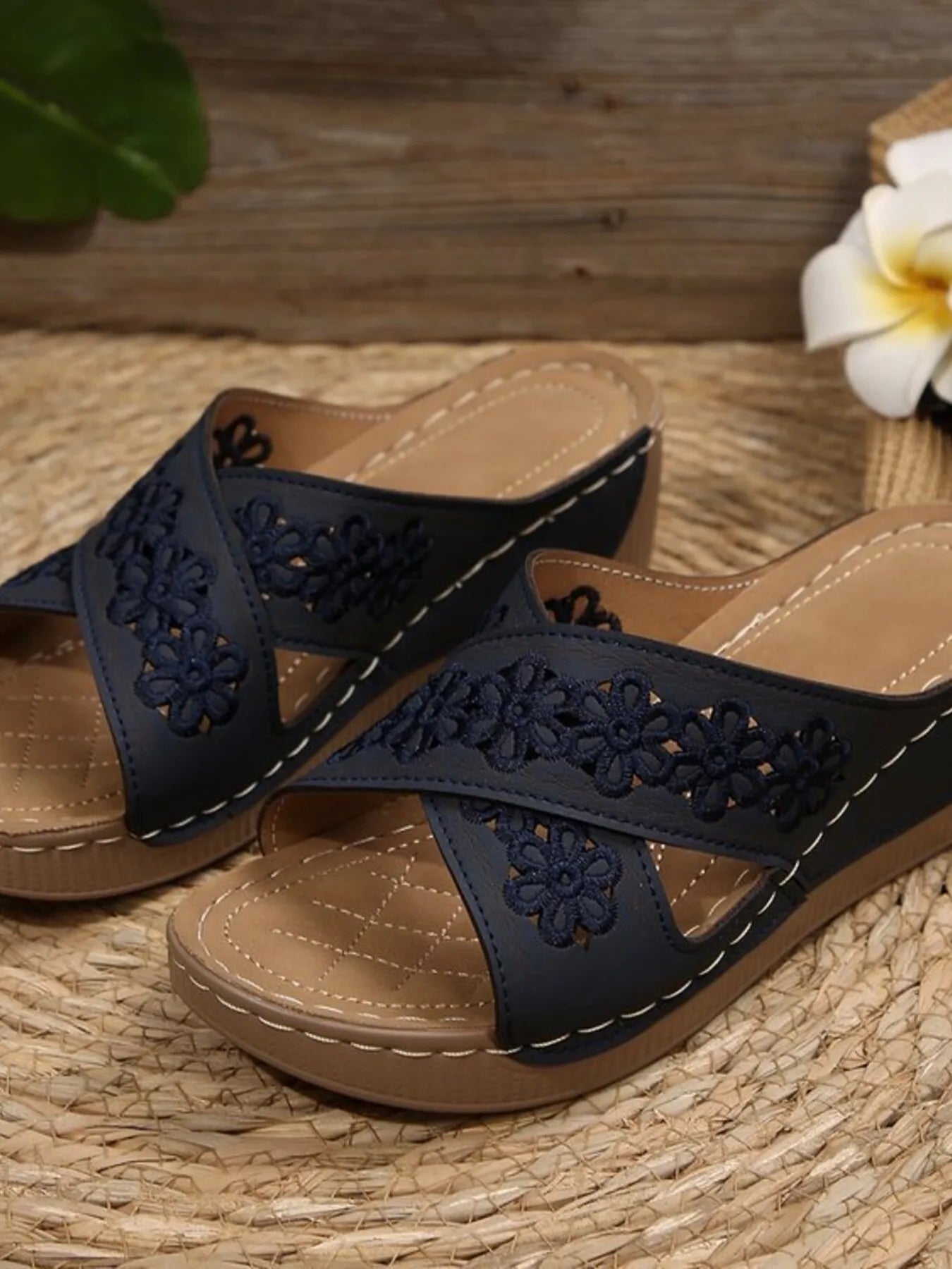 Chic crisscross flower low heel wedge sandals.