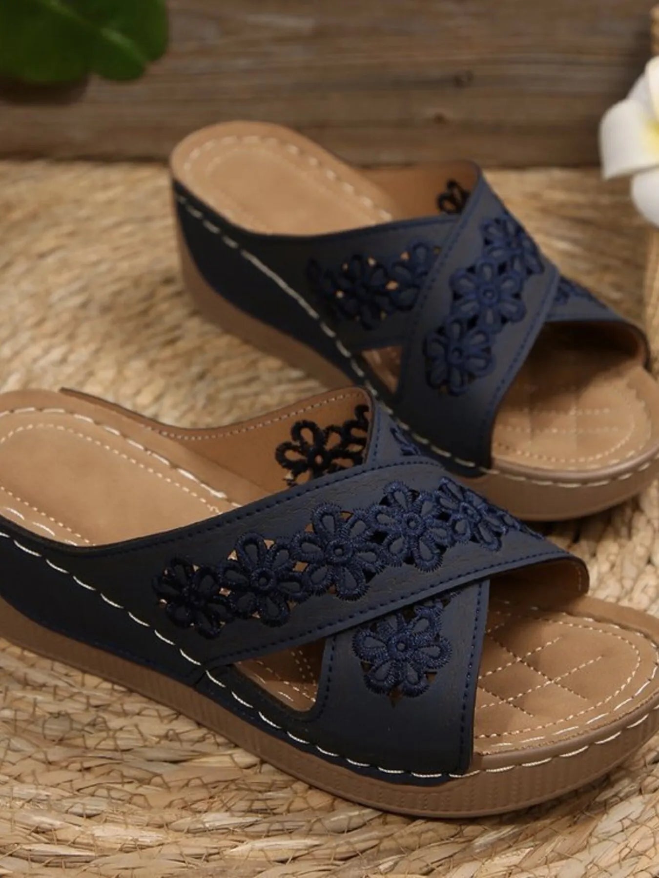 Chic crisscross flower low heel wedge sandals.