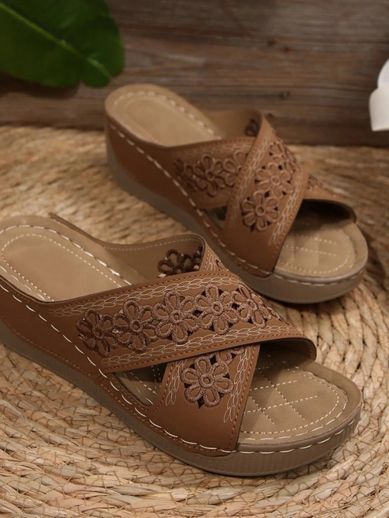 Chic crisscross flower low heel wedge sandals.