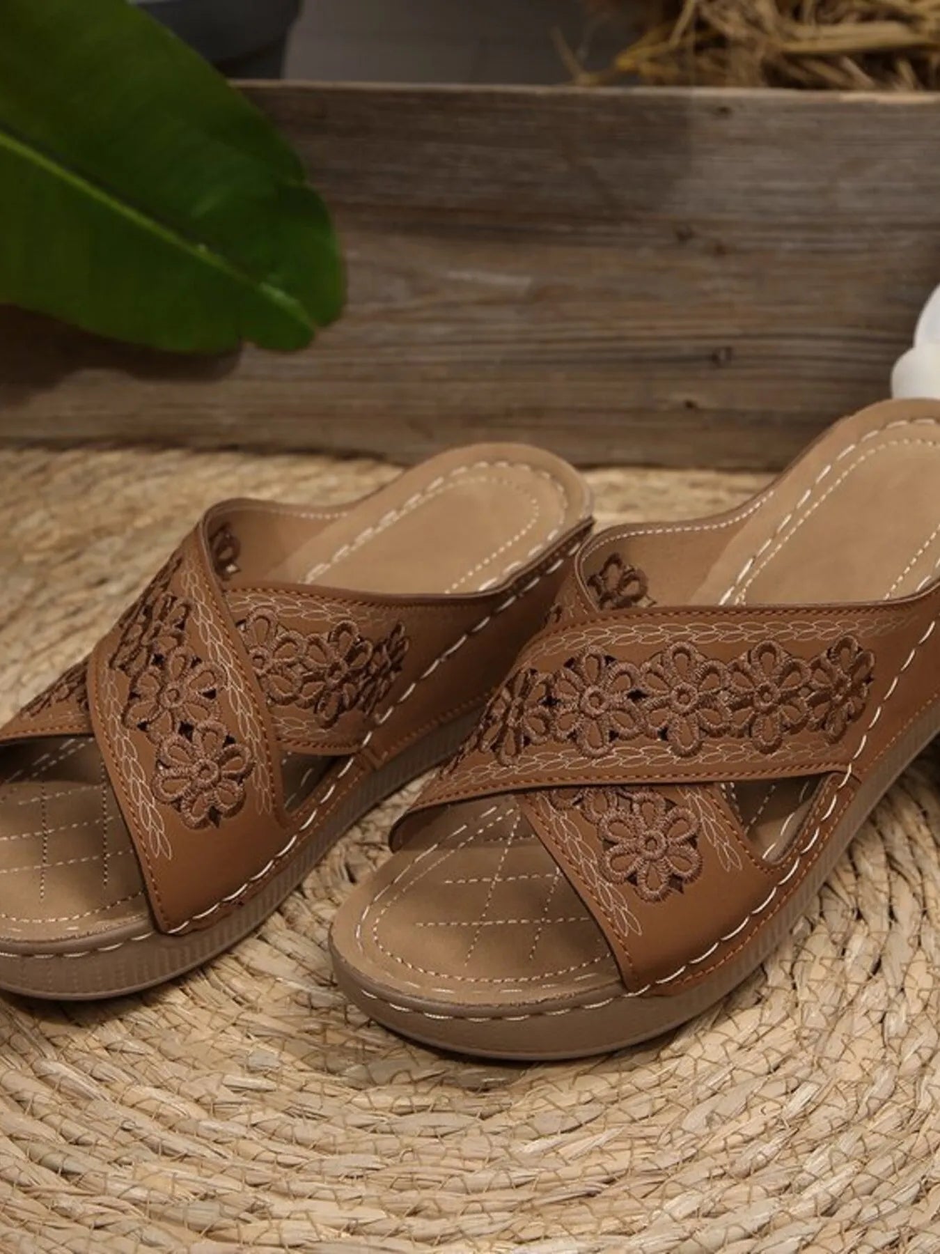 Chic crisscross flower low heel wedge sandals.