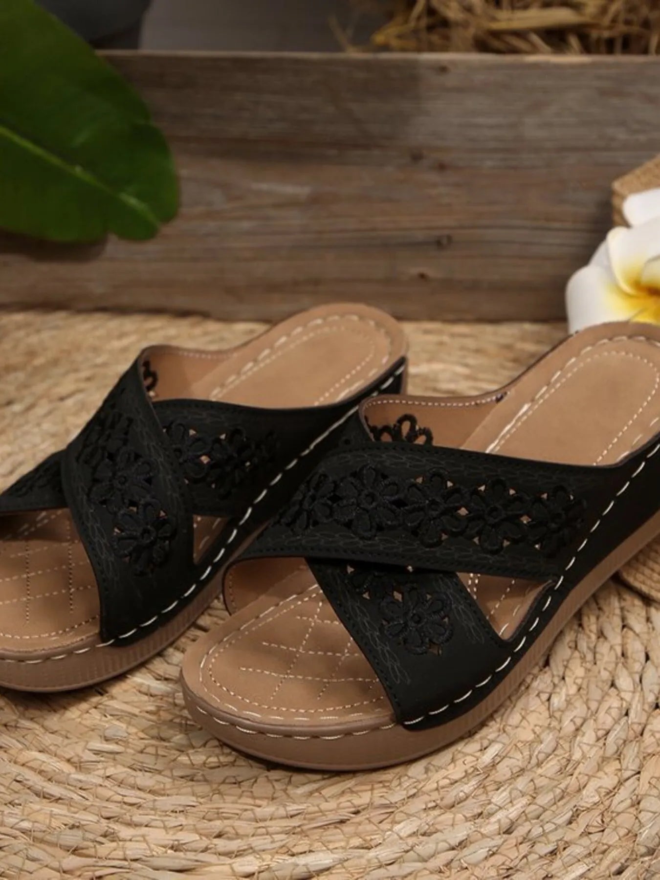 Chic crisscross flower low heel wedge sandals.