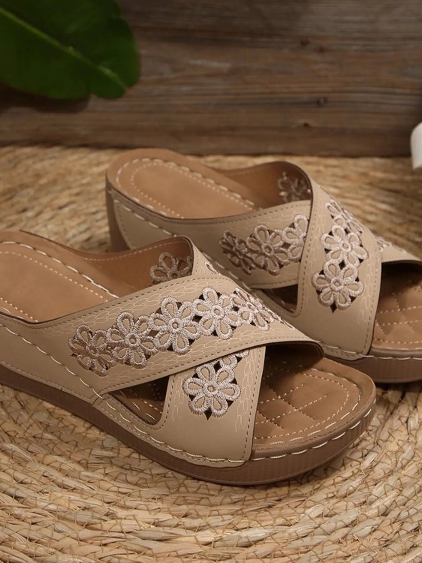 Chic crisscross flower low heel wedge sandals.