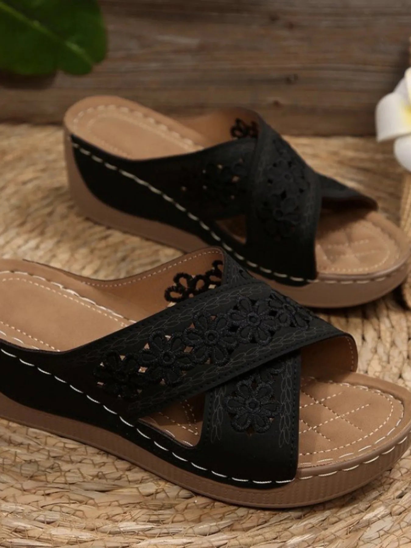 Chic crisscross flower low heel wedge sandals.