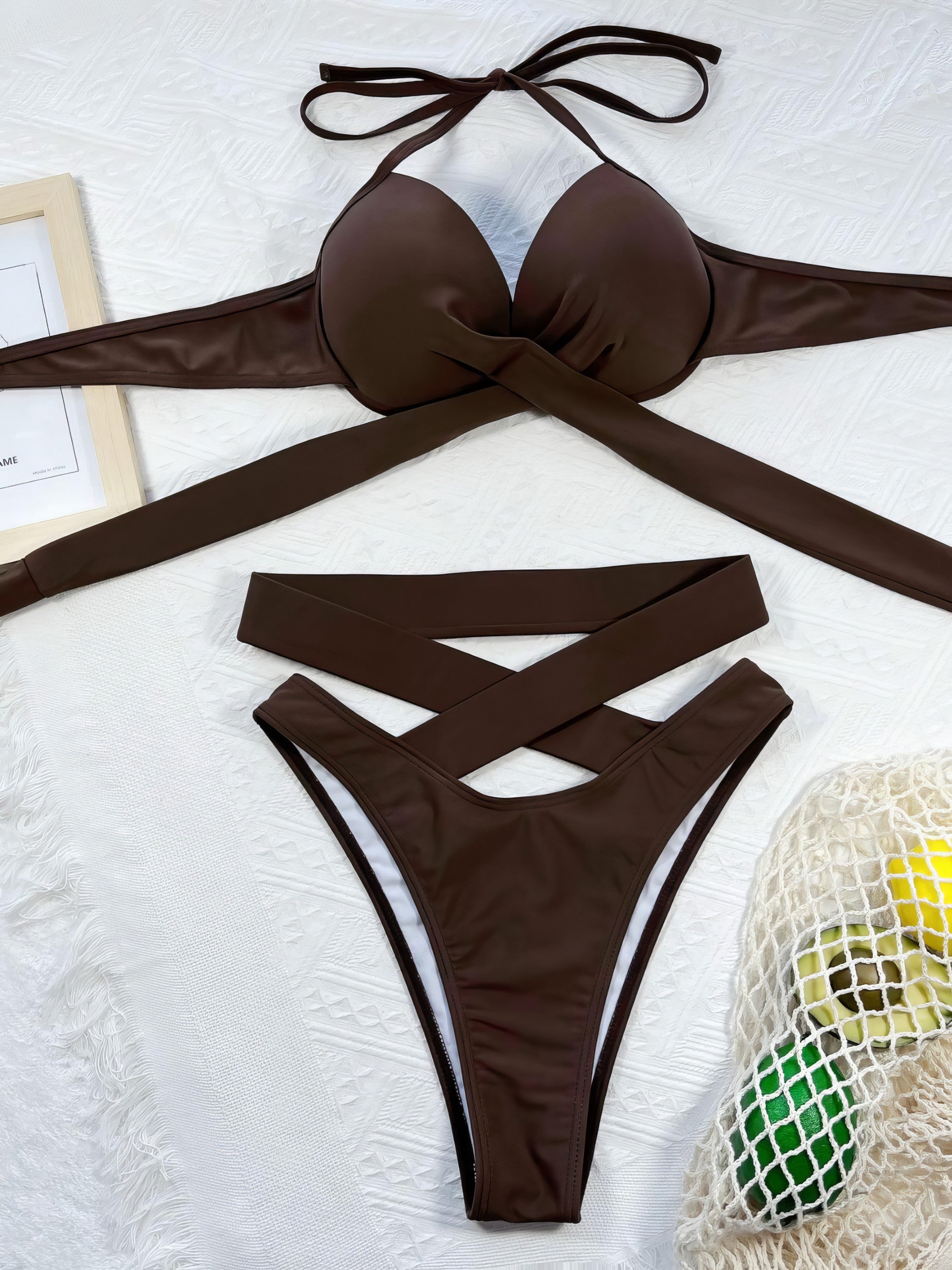 Ruched crisscross halter neck bikini set with removable padding.