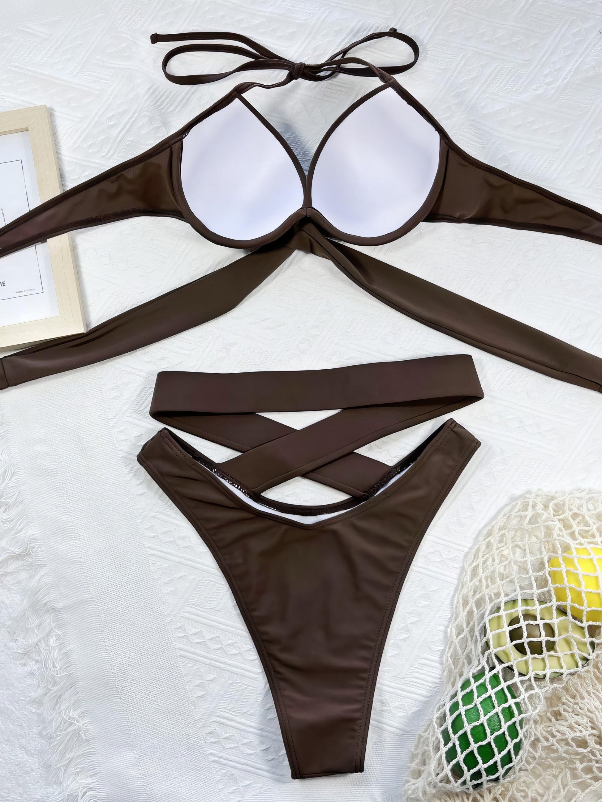 Ruched crisscross halter neck bikini set with removable padding.