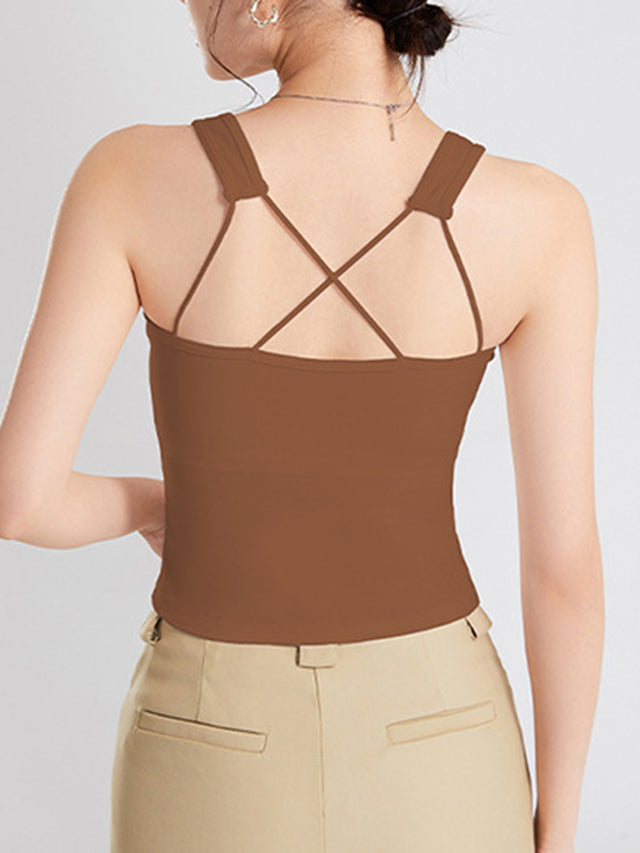 Crisscross scoop neck wide strap cropped tank top with chest pads.
