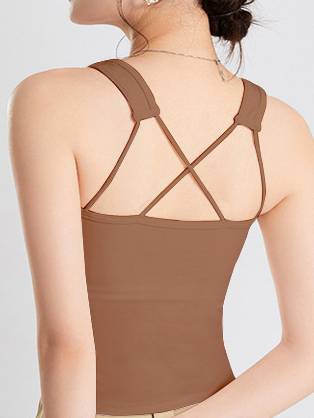 Crisscross scoop neck wide strap cropped tank top with chest pads.