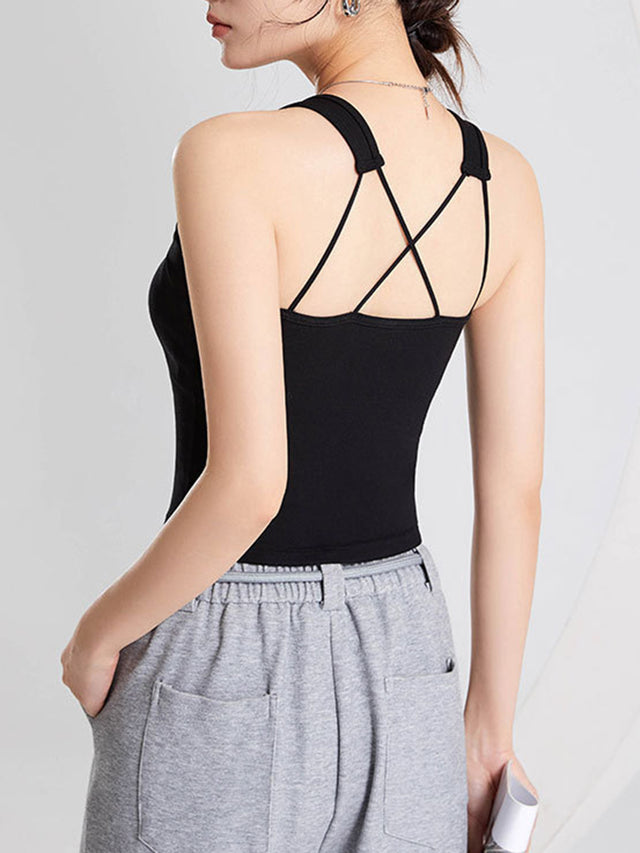 Crisscross scoop neck wide strap cropped tank top with chest pads.
