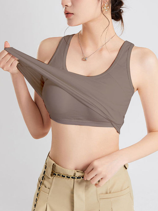 Crisscross scoop neck wide strap cropped tank top with chest pads.