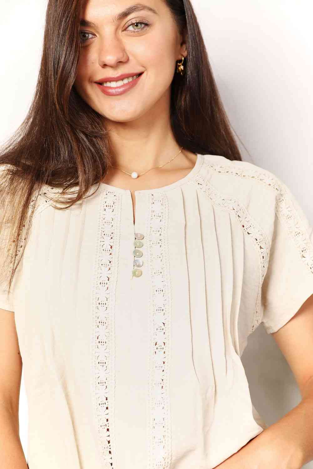 Double Take crochet buttoned short sleeves top.