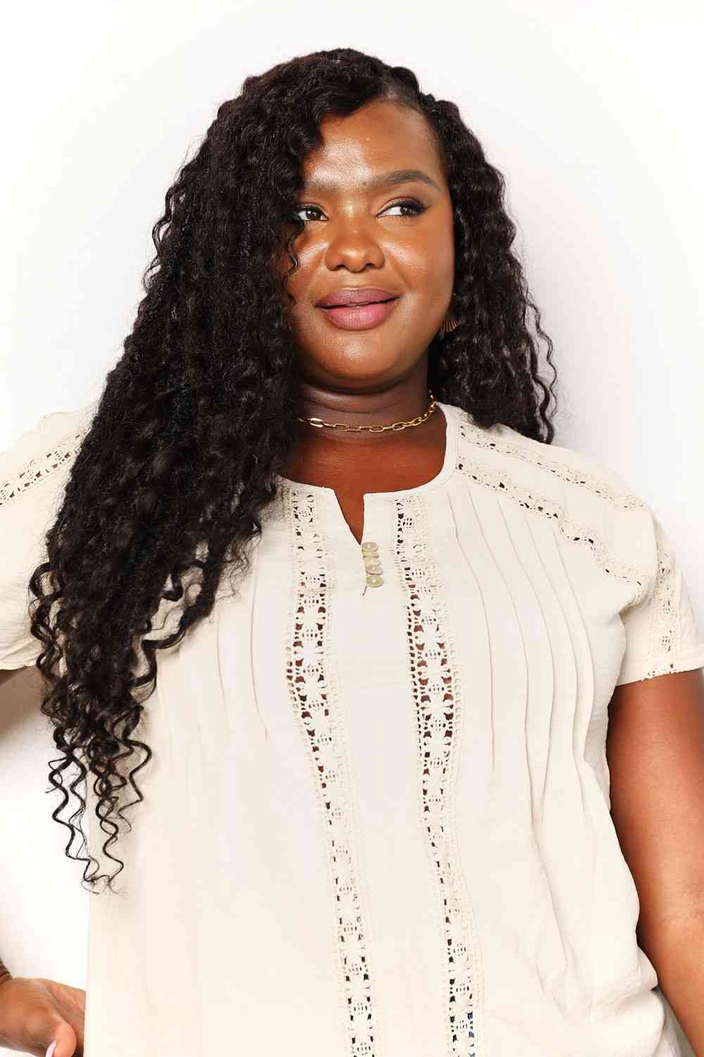 Double Take crochet buttoned short sleeves top.