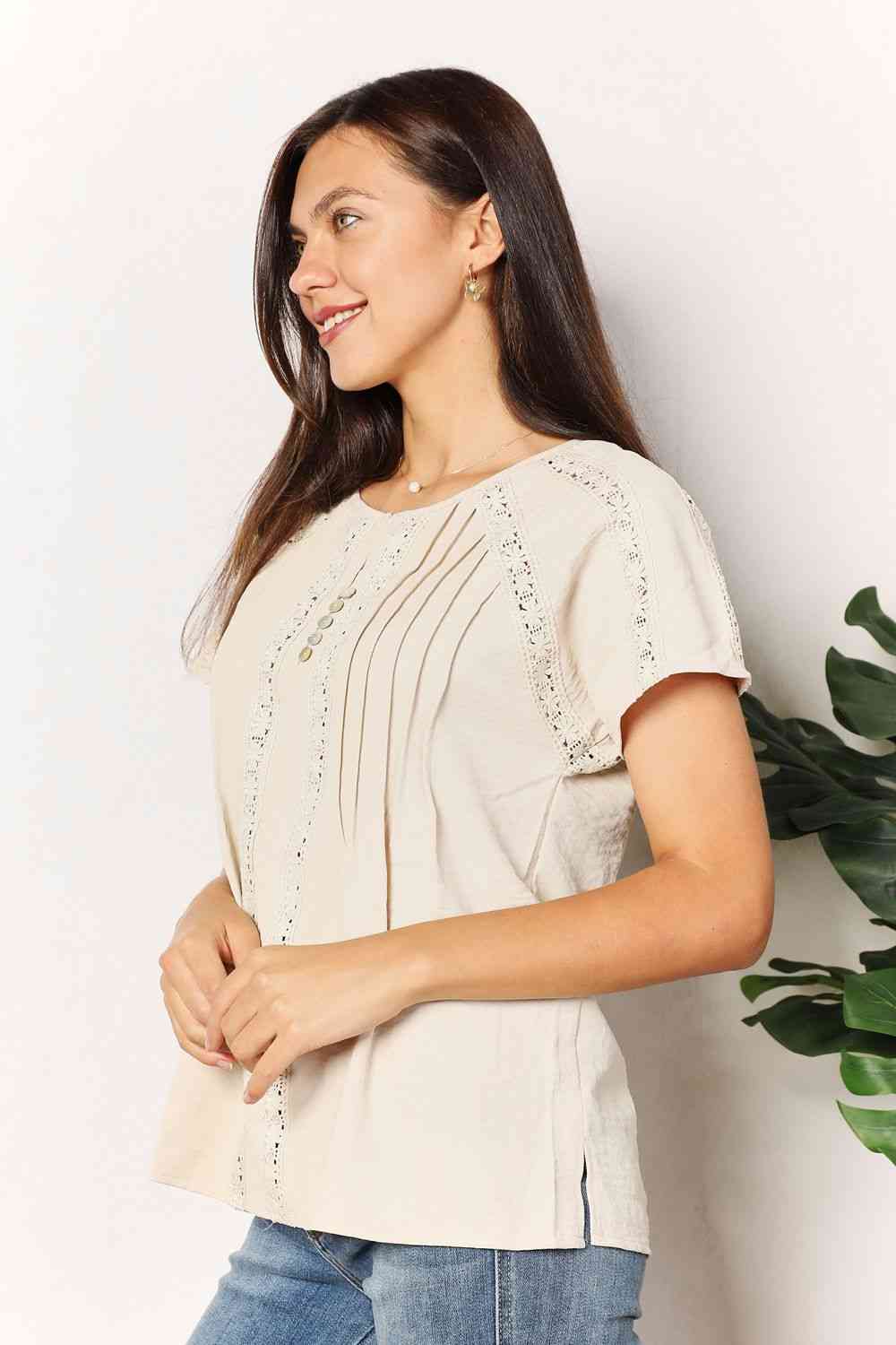 Double Take crochet buttoned short sleeves top.