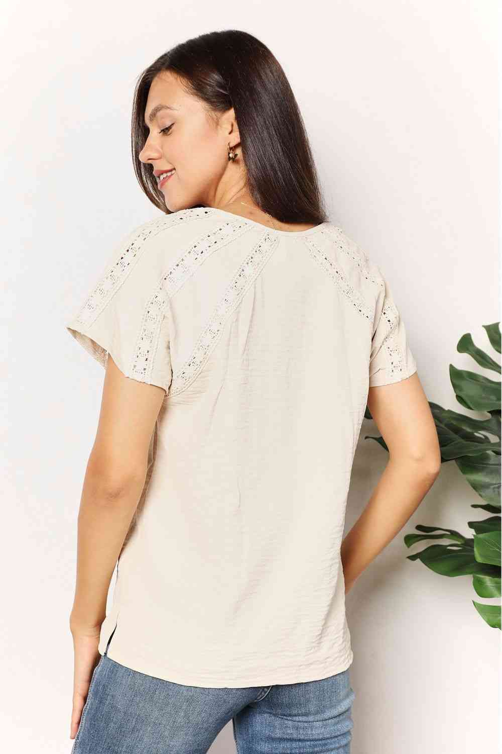 Double Take crochet buttoned short sleeves top.
