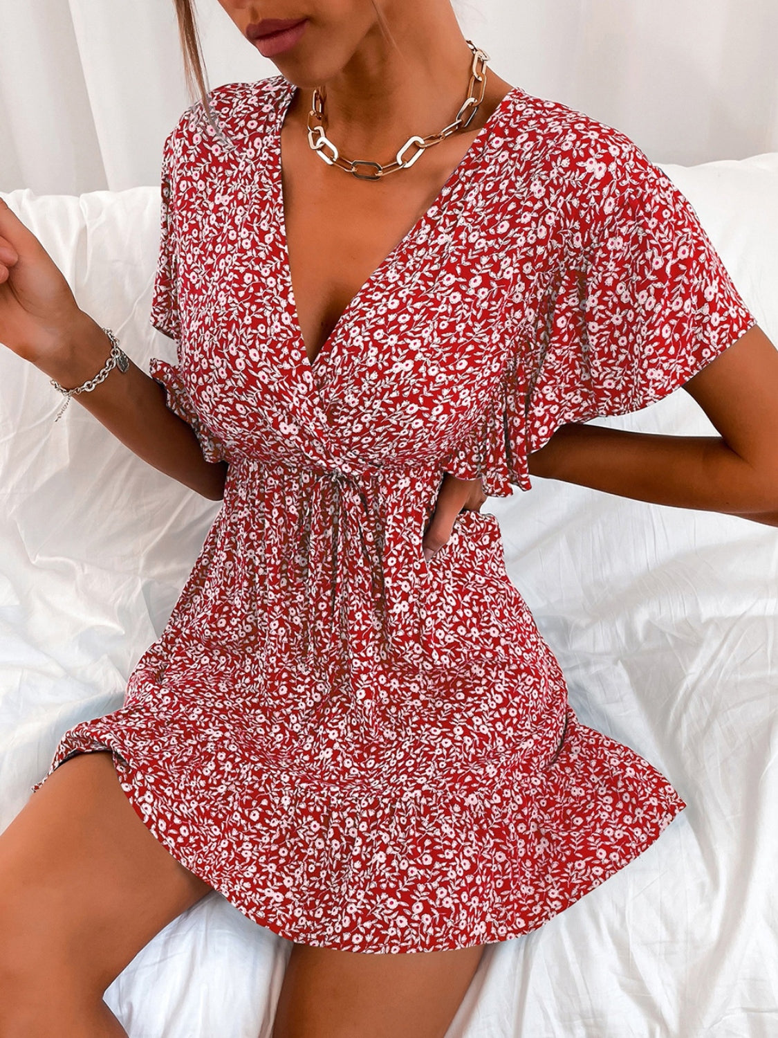 Cutout Ditsy Floral Surplice Flounce Sleeve Dress.