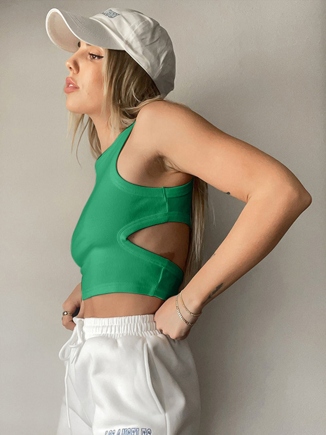 Round neck tank top with cutout details.