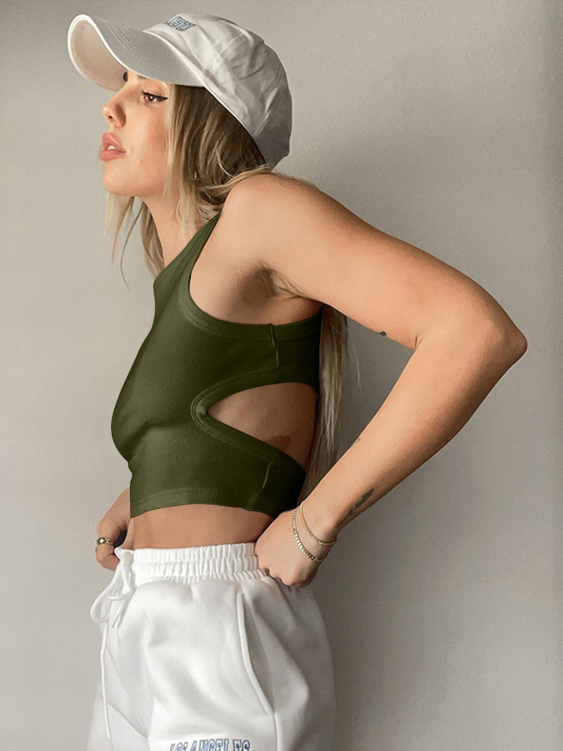 Round neck tank top with cutout details.