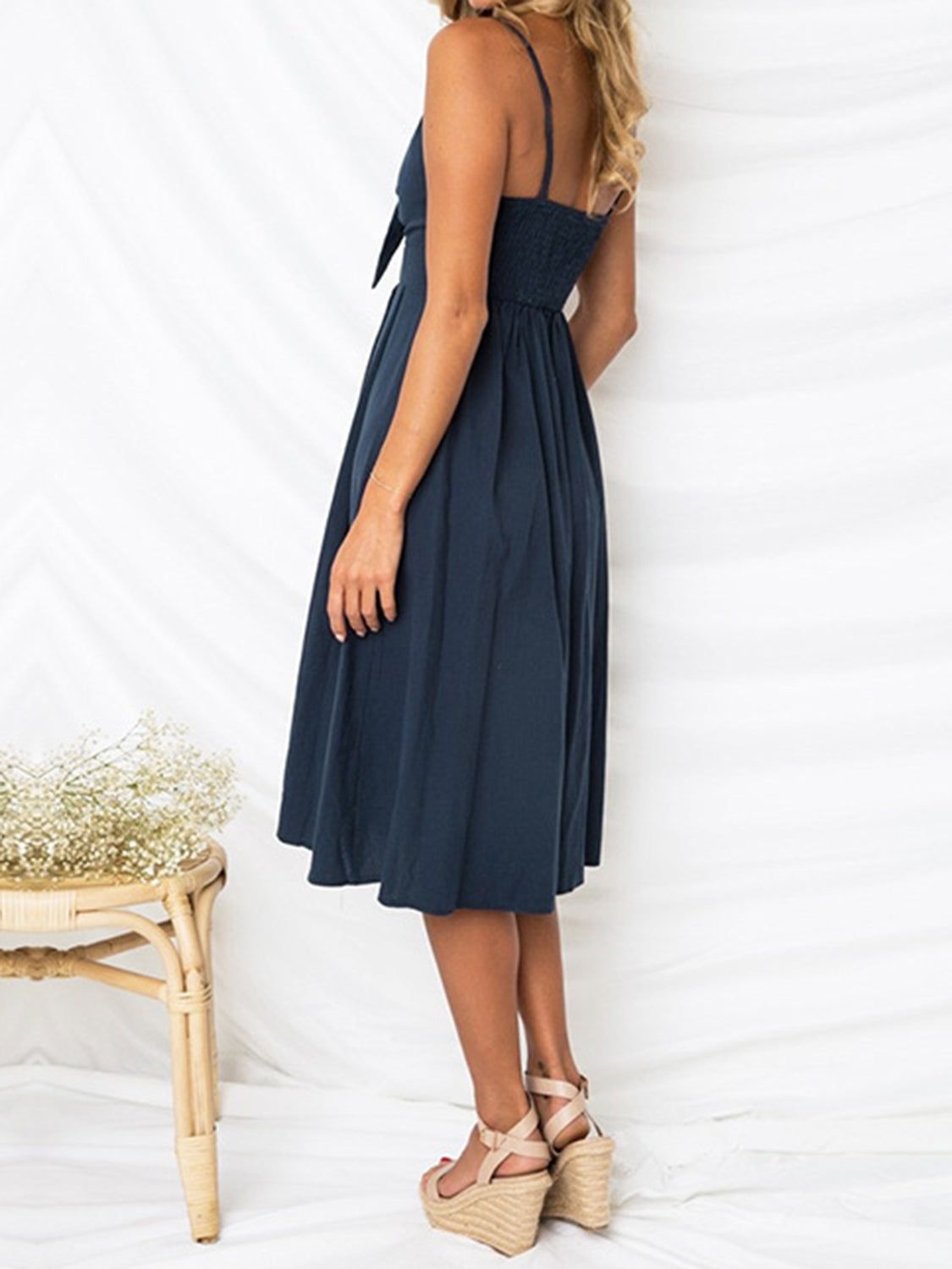 Cutout Smocked Sweetheart Neck Cami Dress with Tied and Decorative Button Details.